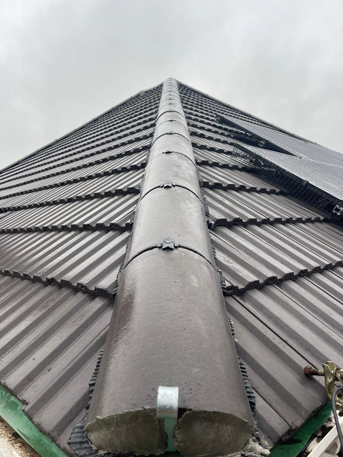New anthracite tiled roof with ridge detail
