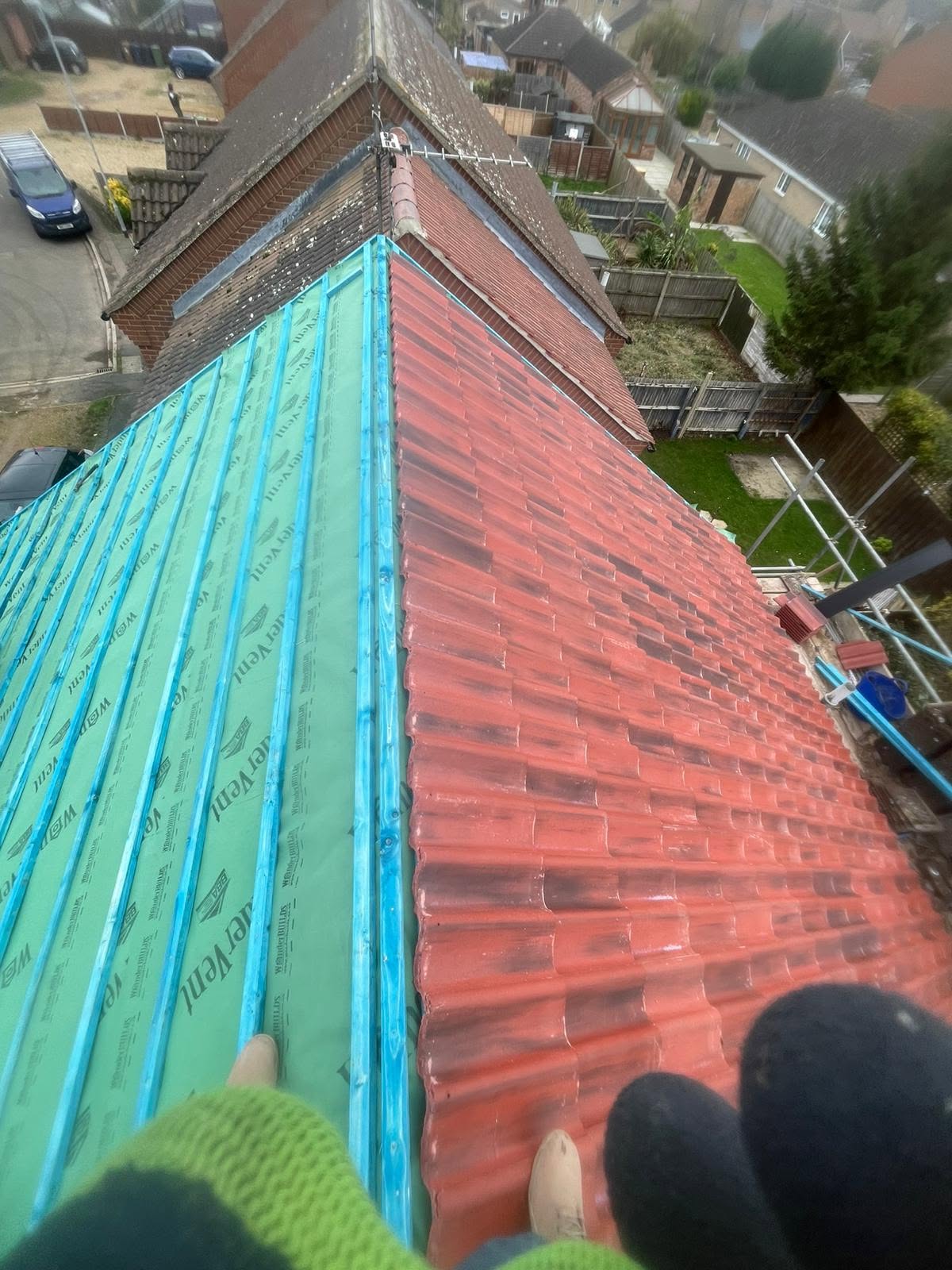Membrane, battens & new tiles