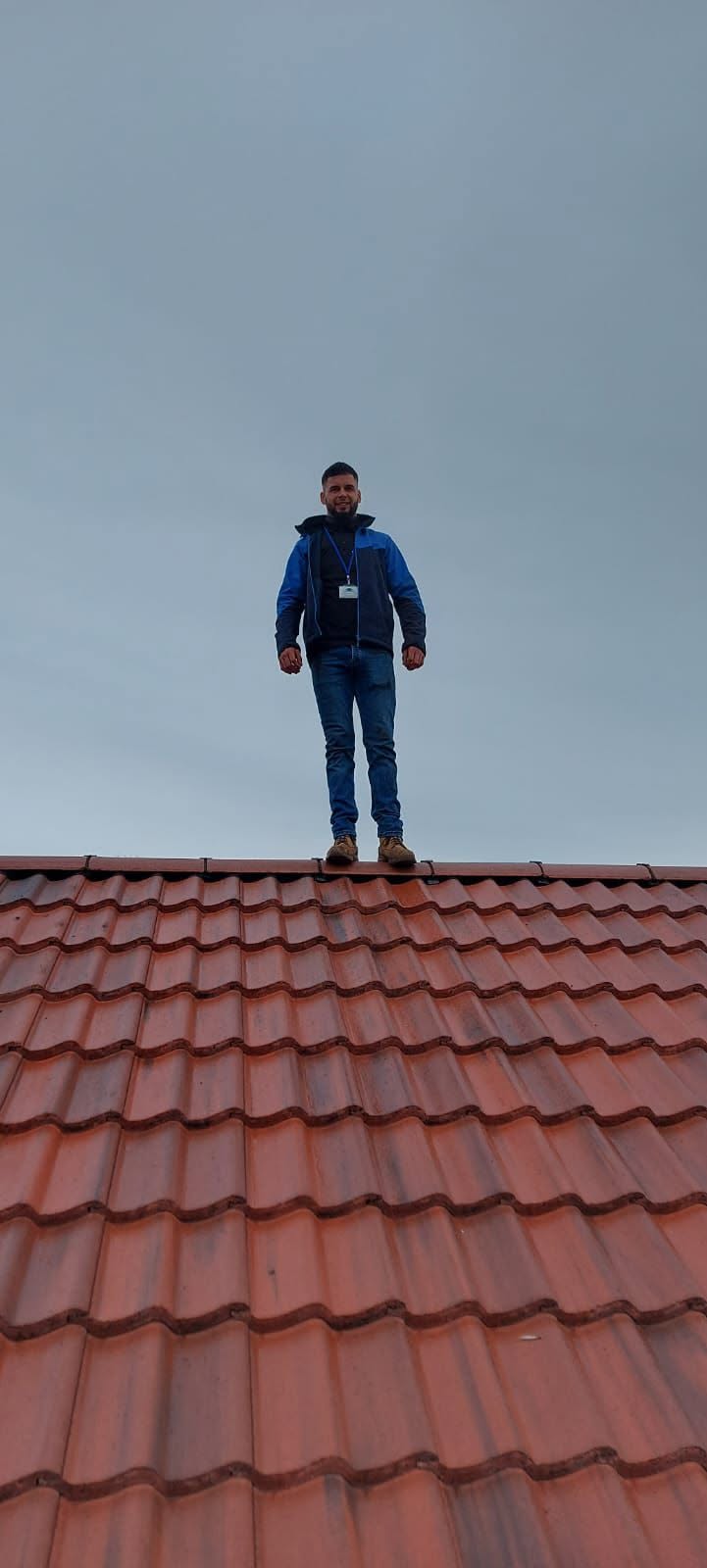 Slipped tiles re-bedded after high winds